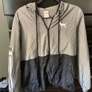 grey and black zip up windbreaker